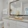 a bathroom with a large mirror
