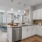 a kitchen with white cabinets