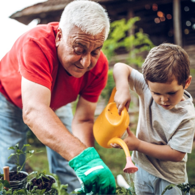 Picture of a grandfather and grandson gardening